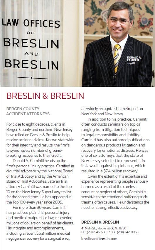 Photo of attorney Donald A. Caminiti, in front of door with the Law Offices of Breslin and Breslin sign